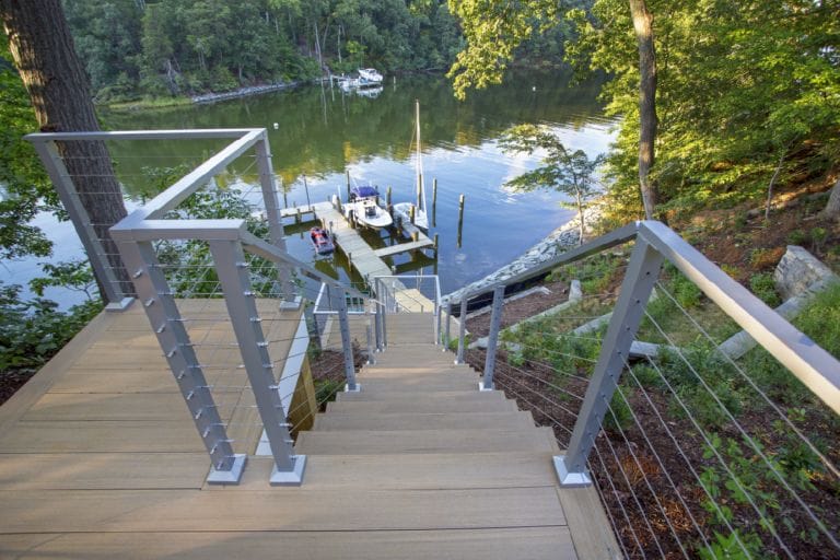 Backyard deck designed for family gatherings, featuring durable wood finishes.