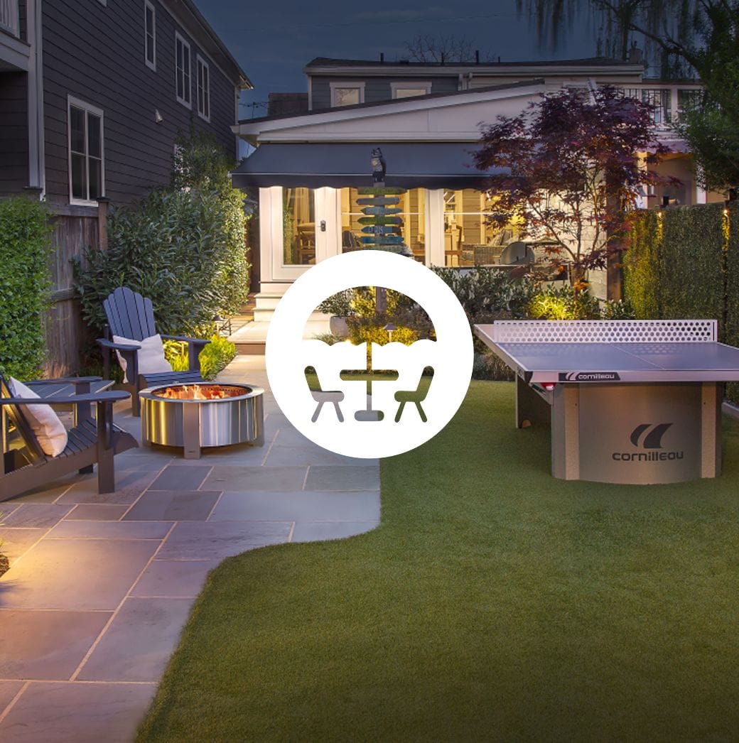 Outdoor living space with patio seating and firepit